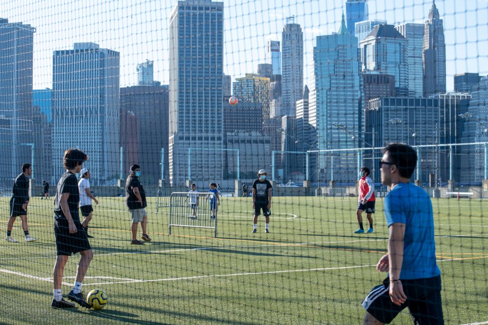 Soccer players in Brooklyn Bridge Park