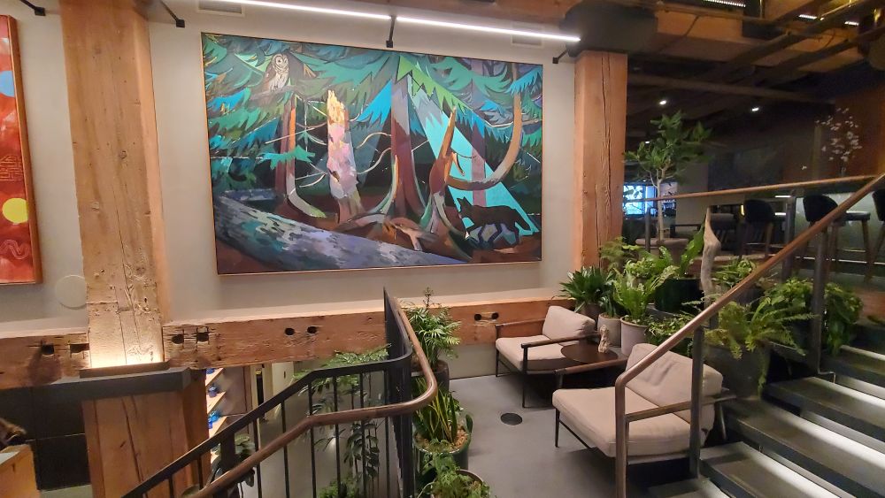 Staircase and artwork at Populus Seattle.