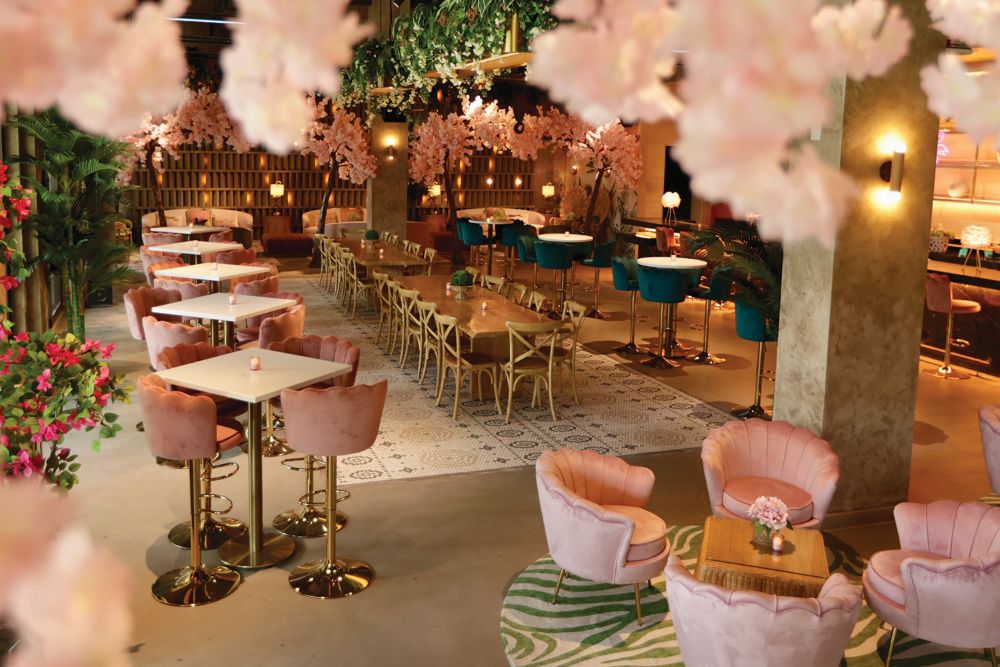 Throw Social food hall interior, with lots of pink decor.