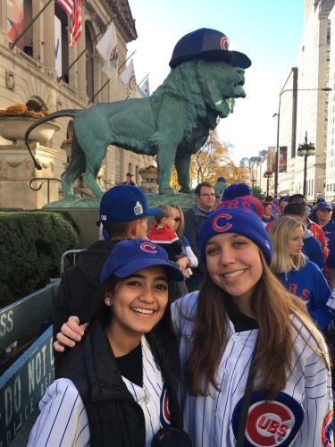 Taylor (right) with her friend maya at the Cubs’ Parade in 2016.
