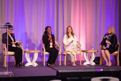 Taylor Smith and panelists at the 2024 WITH Conference