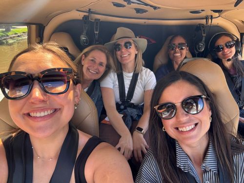 Taylor and friends on a helicopter ride with Microflite Aviation