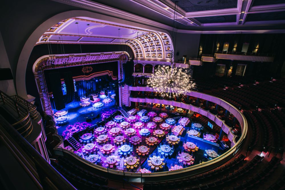 Photo of The Met, Philadelphia, set up for an event with colorful, bright lights.