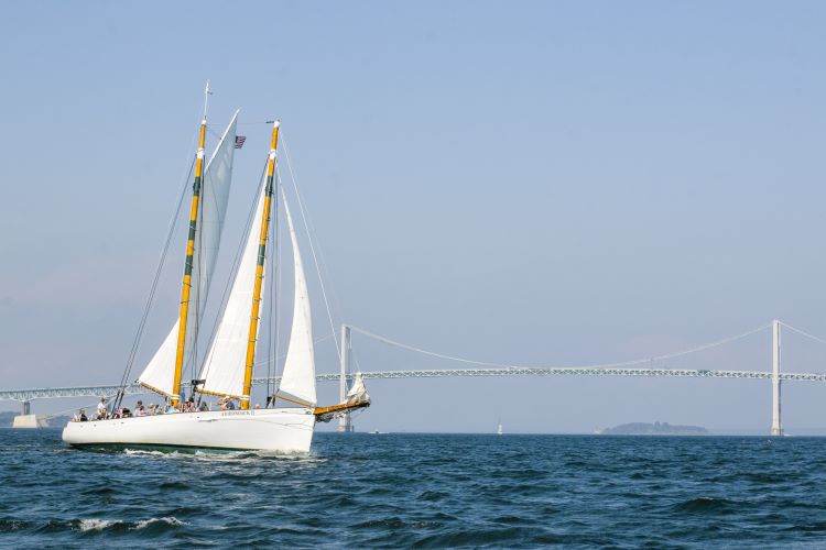 A boat sailing in one of Newport's harbors.