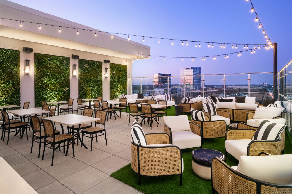 Photo of rooftop space with view of Raleigh skyline at Urban Oak.