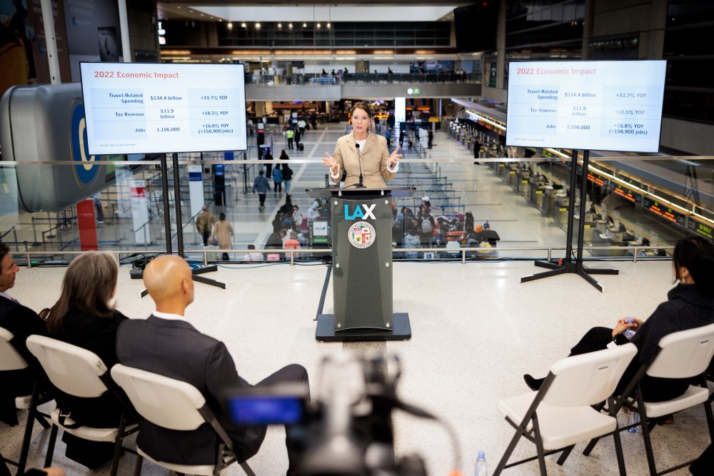 Photo of Visit California CEO Caroline Beteta speaking at California Tourism Month event.