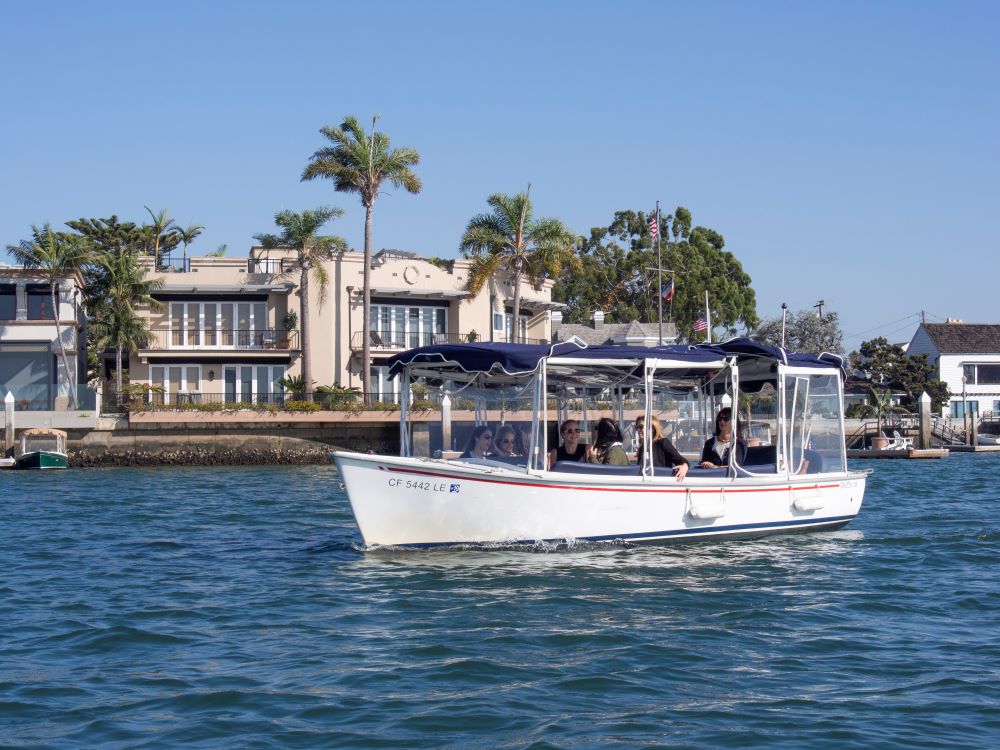 Photo of people cruising in Newport Harbor in a Duffy Boat.