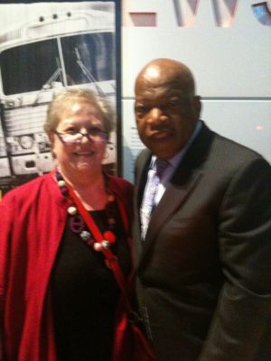 Photo of Joan Eisenstodt, on the left, standing with Rep. John Lewis.