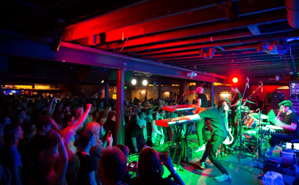 People dancing to a DJ at Blueberry Hill in St. Louis.
