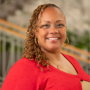 Photo of Dominique Bonds in a red shirt.