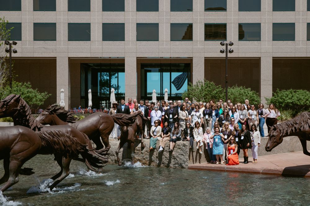 Meetings Today LIVE! National attendees pose in front of Hilton Anatole