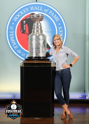 Meetings Today editor poses with Stanley Cup at the Hockey Hall of Fame