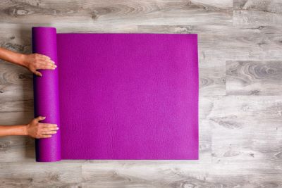 Unrolling a yoga mat