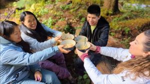 Group cheers during mushroom foraging tour