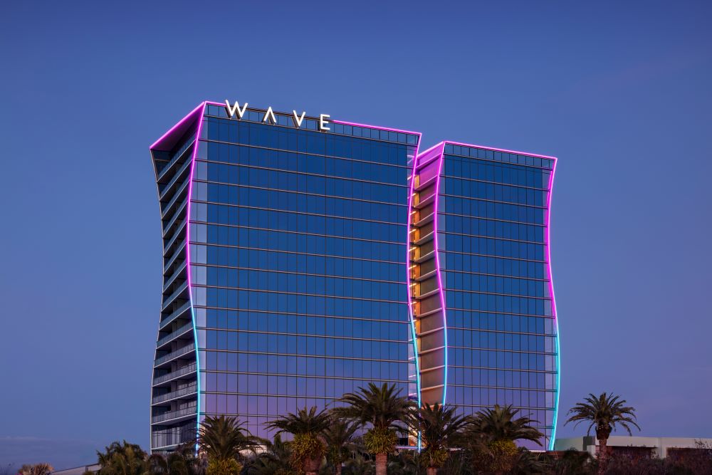 Lake Nona Wave Hotel exterior at night