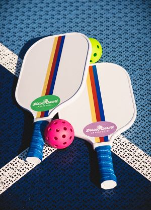 Disco court paddles and pickleball from Kimpton La Peer