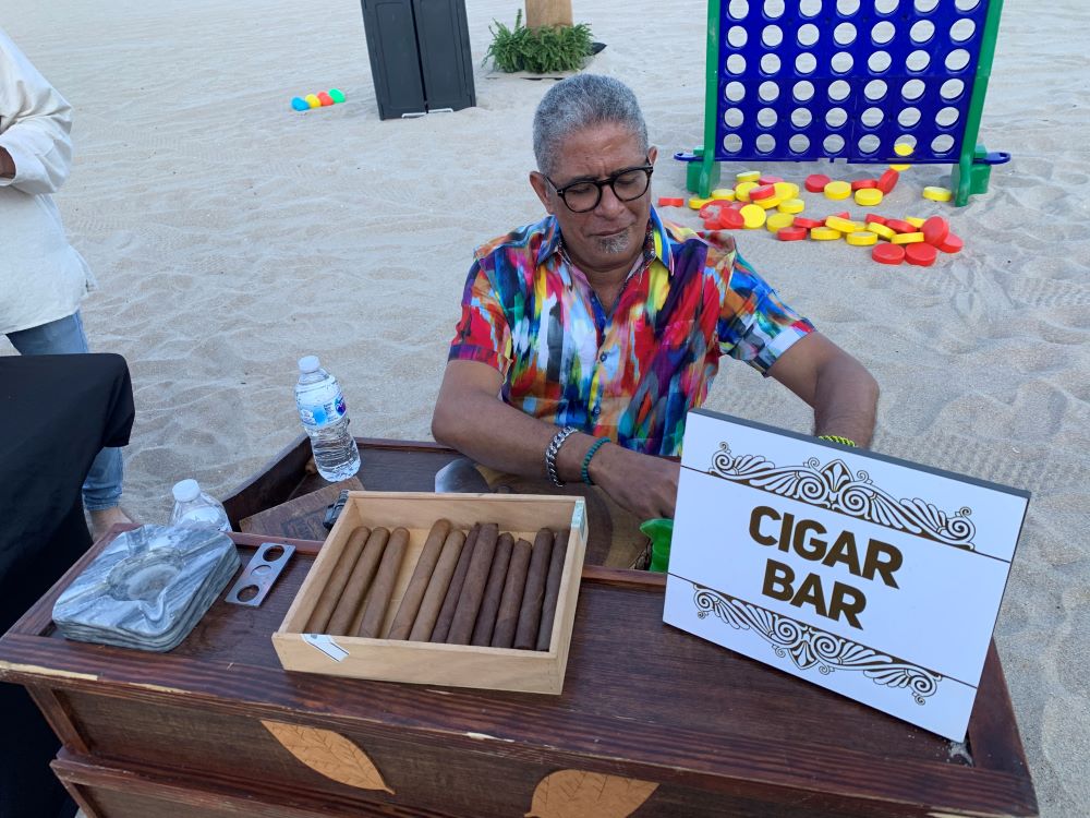 Cigar roller at AFSA event on the beach