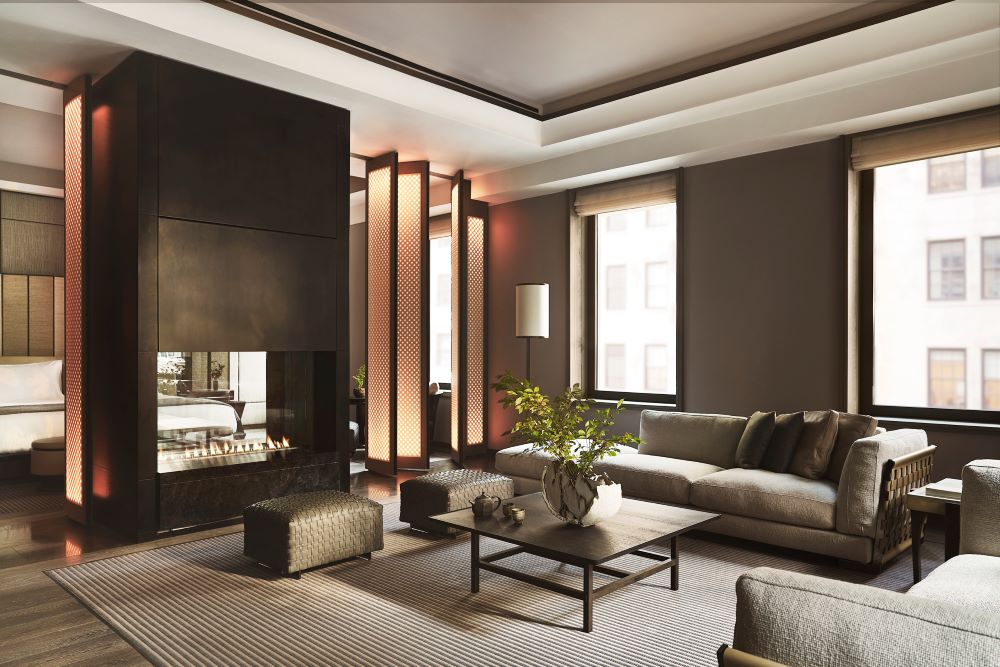 Aman New York suite with a fireplace