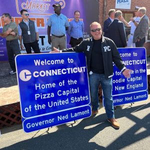 upload Colin M. Caplan with CT interstate pizza signs 