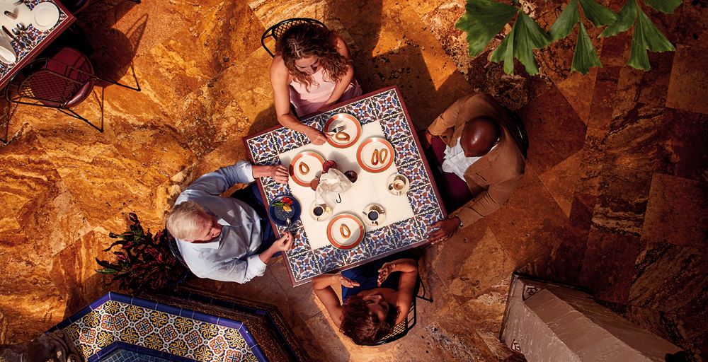 Four people eating at a restaurant in St. Augustine