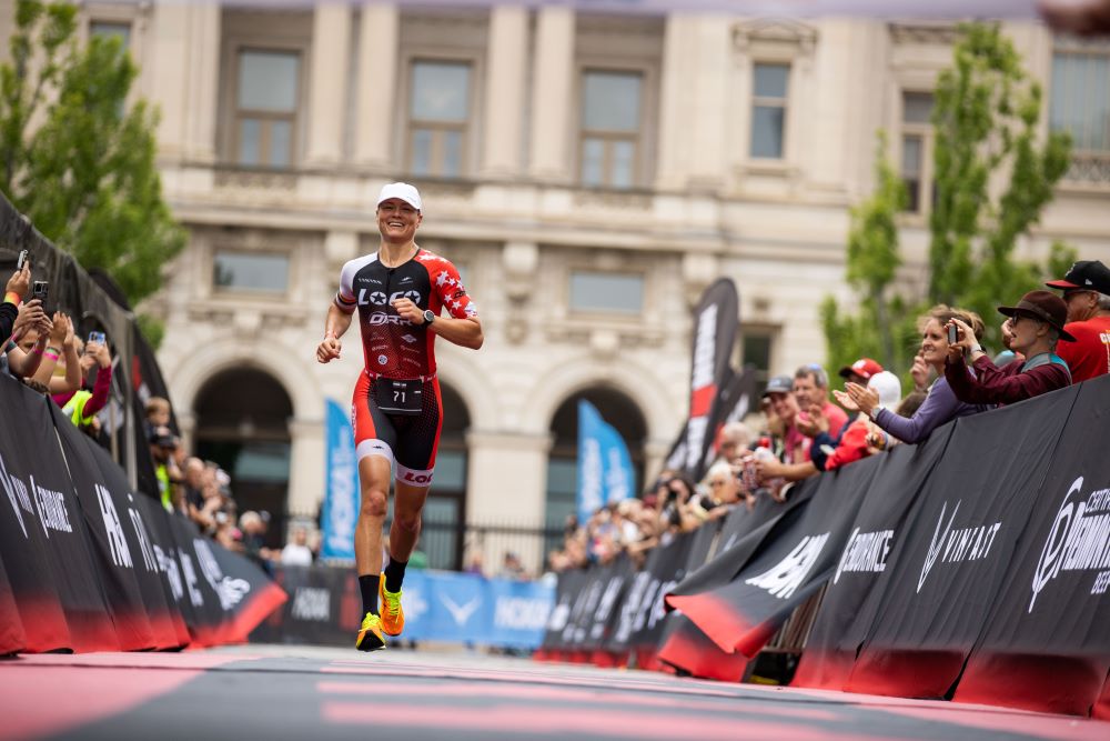 IRONMAN athlete runs on the streets of Des Moines