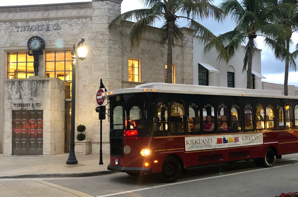 Trolley drives by Tiffany & Co. on Worth Avenue