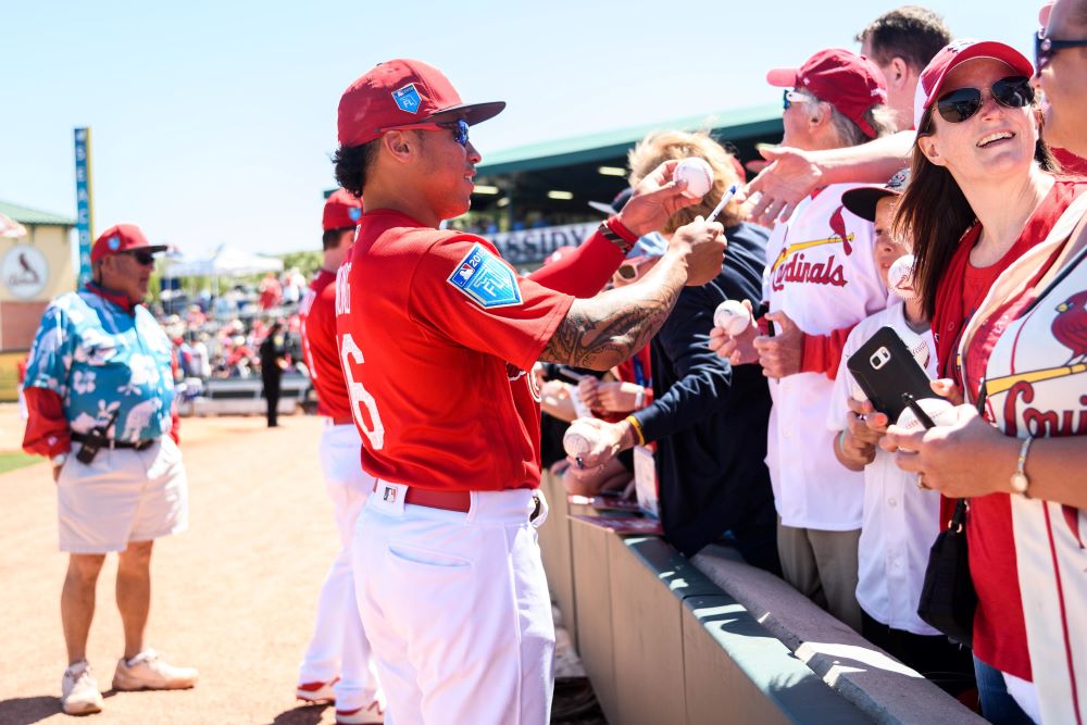  Player signing an autograph at Roger Dean Chevrolet Stadium