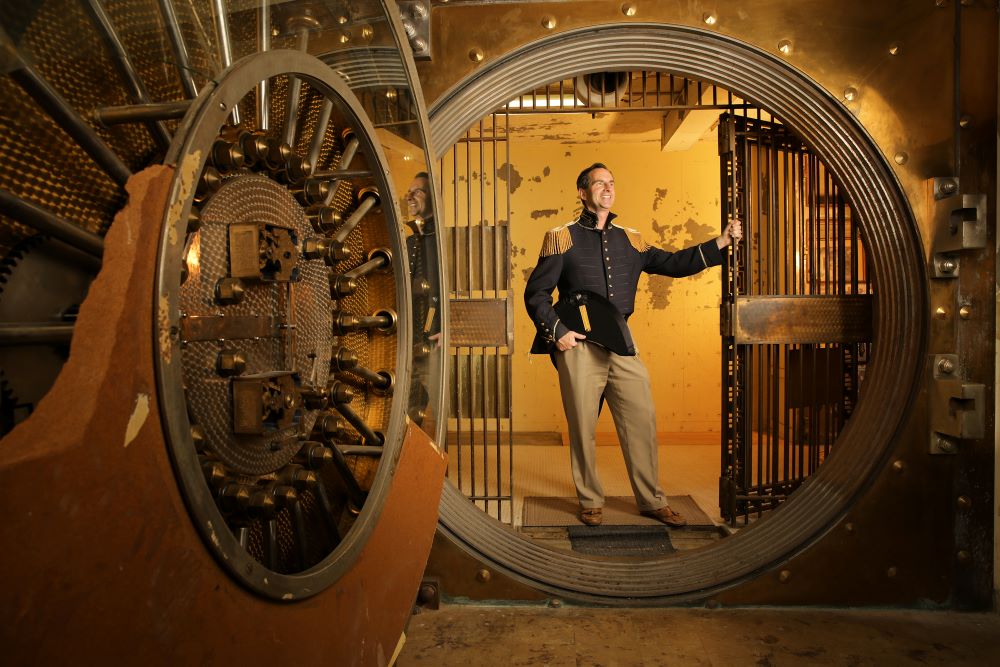 Gary Sass standing in front of a vault