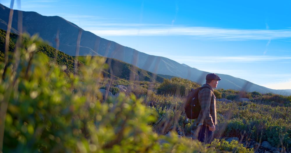 Hiker along a scenic route in Ontario, California