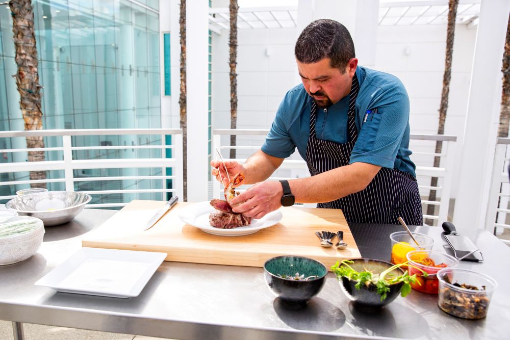 Chef preparing food at Ontario Convention Center