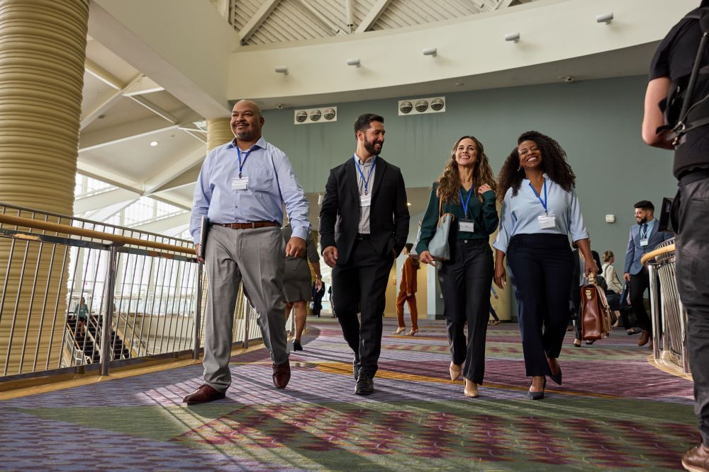 Attendees walking to a meeting inside the Orange County Convention Center in Orlando