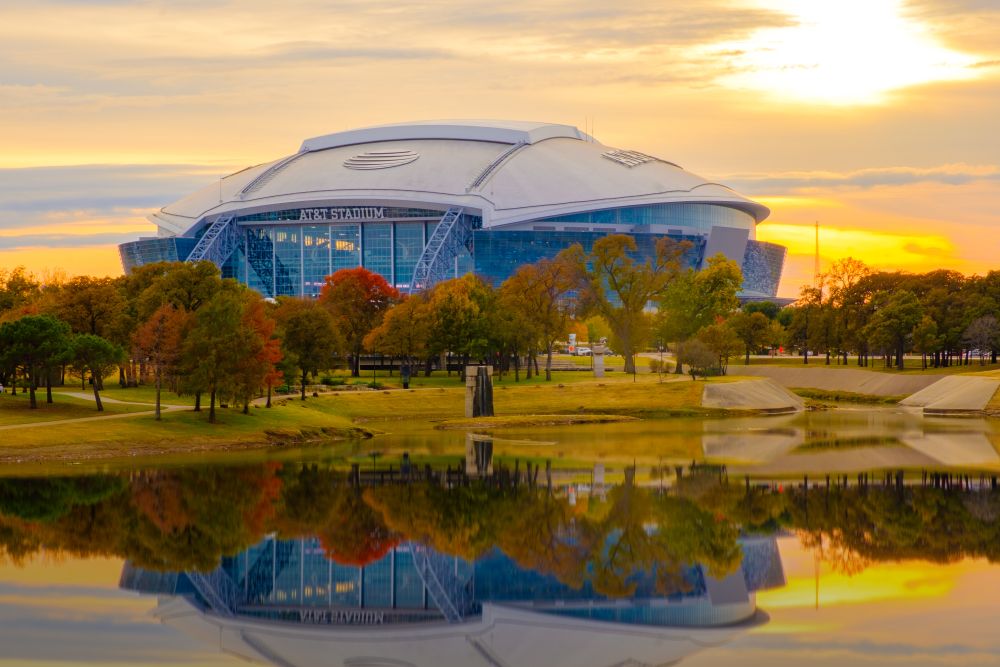 AT&T Stadium exterior at sunset