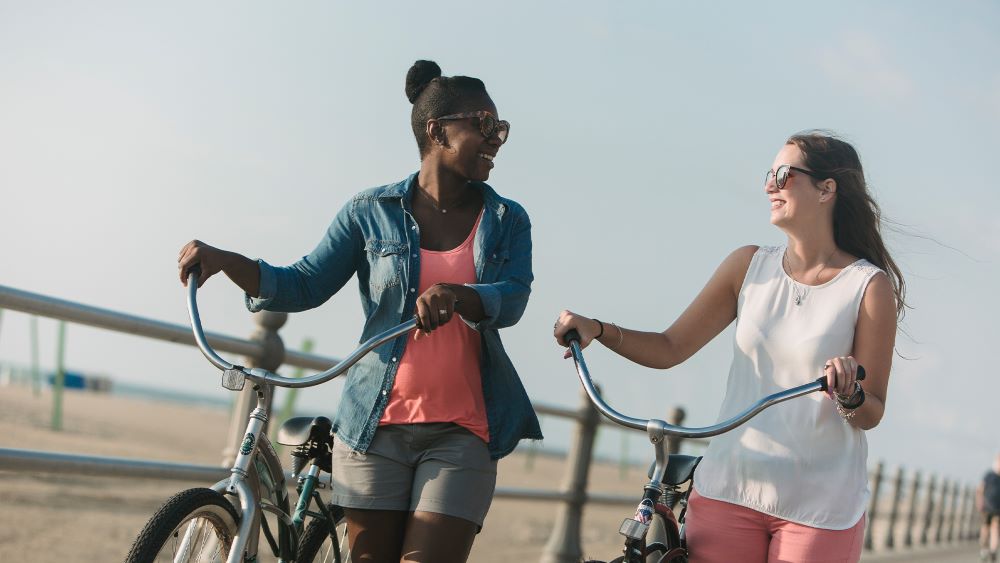 Two people riding bicycles in Virginia Beach