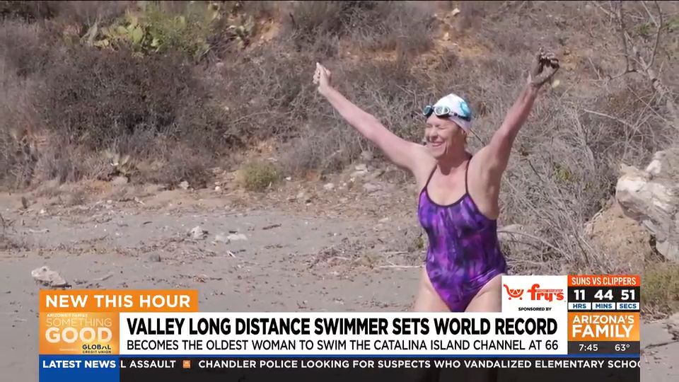Photo of Deborah Gardner at end of swim, from a television news still.