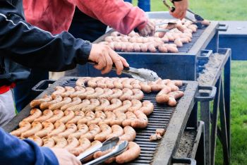 Brats on the grill in Sheboygan Credit: Courtesy of Visit Sheboygan