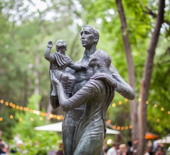Sculpture of man, woman and child