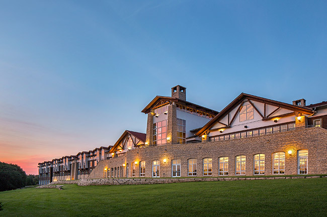 Lied Lodge and Conference Center Building Exterior at Dusk, Credit: Lied Lodge