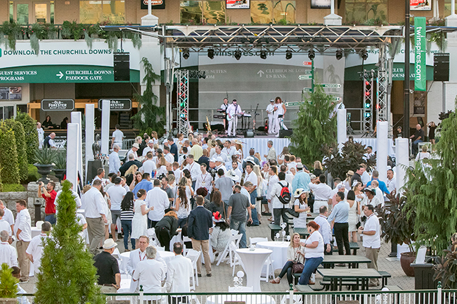 Crowd Dressed in White Attire at a Churchill Downs Event, Louisville