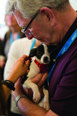 Dick Topping Holding His Soon to Be Adopted Dog