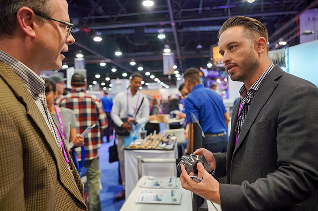 MJBizCon Event Booth Interaction, Credit: MJBizDaily