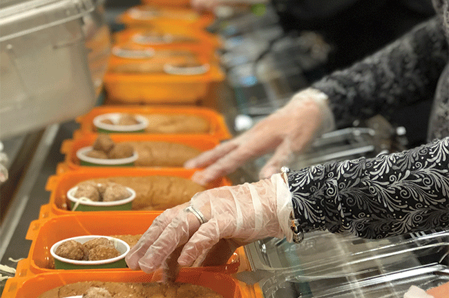 Planners packaging meals