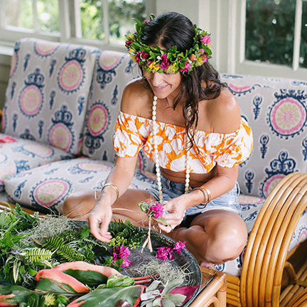 Woman Participating in Haku Lei-Making Session at Queen Kapiolani​