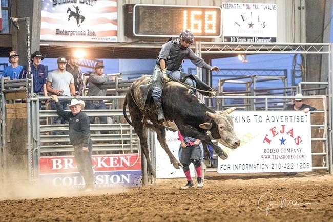 Person Bullriding at Tejas Rodeo Company