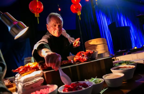 Photo of Wolfgang Puck cooking at Atlanta's Georgia Aquarium.