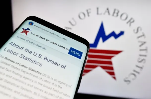 Graphic of U.S. Labor Statistics logo on cell phone and computer screen.