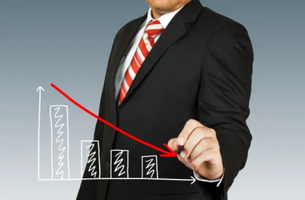Graphic of a business man tracing a downward arrow.
