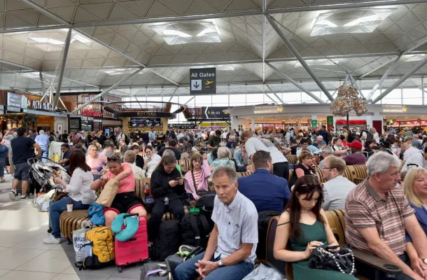 image of travelers stuck in an airport