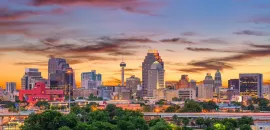 Photo of San Antonio skyline at dusk.