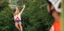 Photo of man ziplining at Wilderness Resort, Wisconsin Dells, Wisconsin.