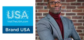Photo of Elliott Ferguson to the right and the Brand USA logo to the left.